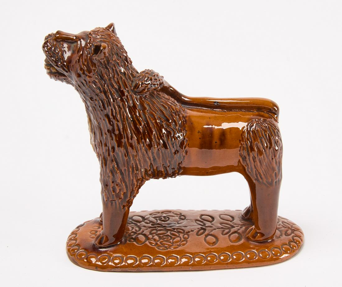 Redware Lion: Redware lion. Pennsylvania, mid 19th century. H 5-5/8" L 5-7/8" D 2-7/8". Condition: Excellent original condition. Loss to tongue. Provenance: Brimfield collection, Chris Machmer collection. Copy and