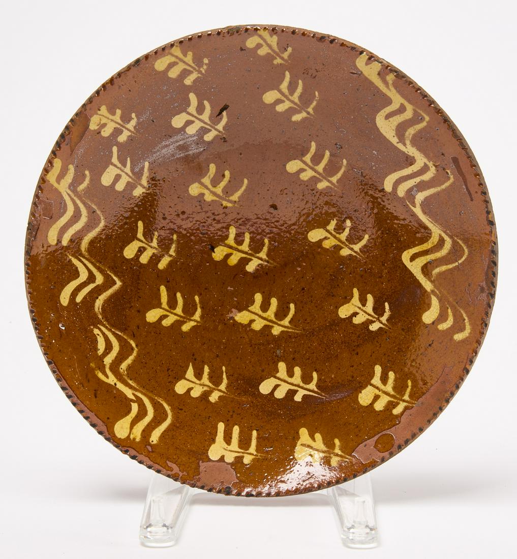 Redware Plate: Redware plate. Pennsylvania, circa 1850. D 10-1/4". Condition: Fine original condition. A few very minor rim flecks. Copy and paste this link for high-res images: https://www.dropbox.com/sh/tky1zw8wio
