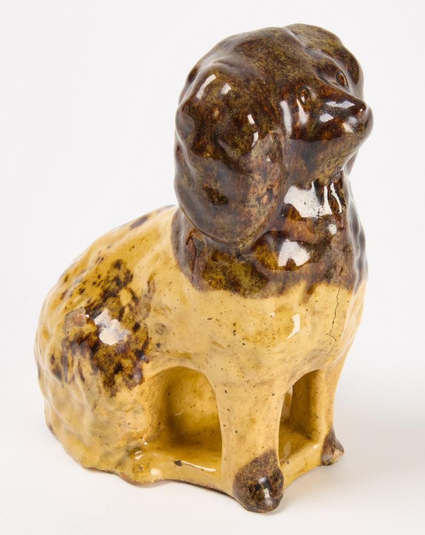 Large Redware Spaniel: Large Redware Spaniel. Galena, Illinois, mid 19th century. H 8-7/8" W 6-7/8" D 7-1/8". Condition: Excellent original condition. Small glaze loss area of approx. 1/2" x 3/4". Minor glaze losses to tip