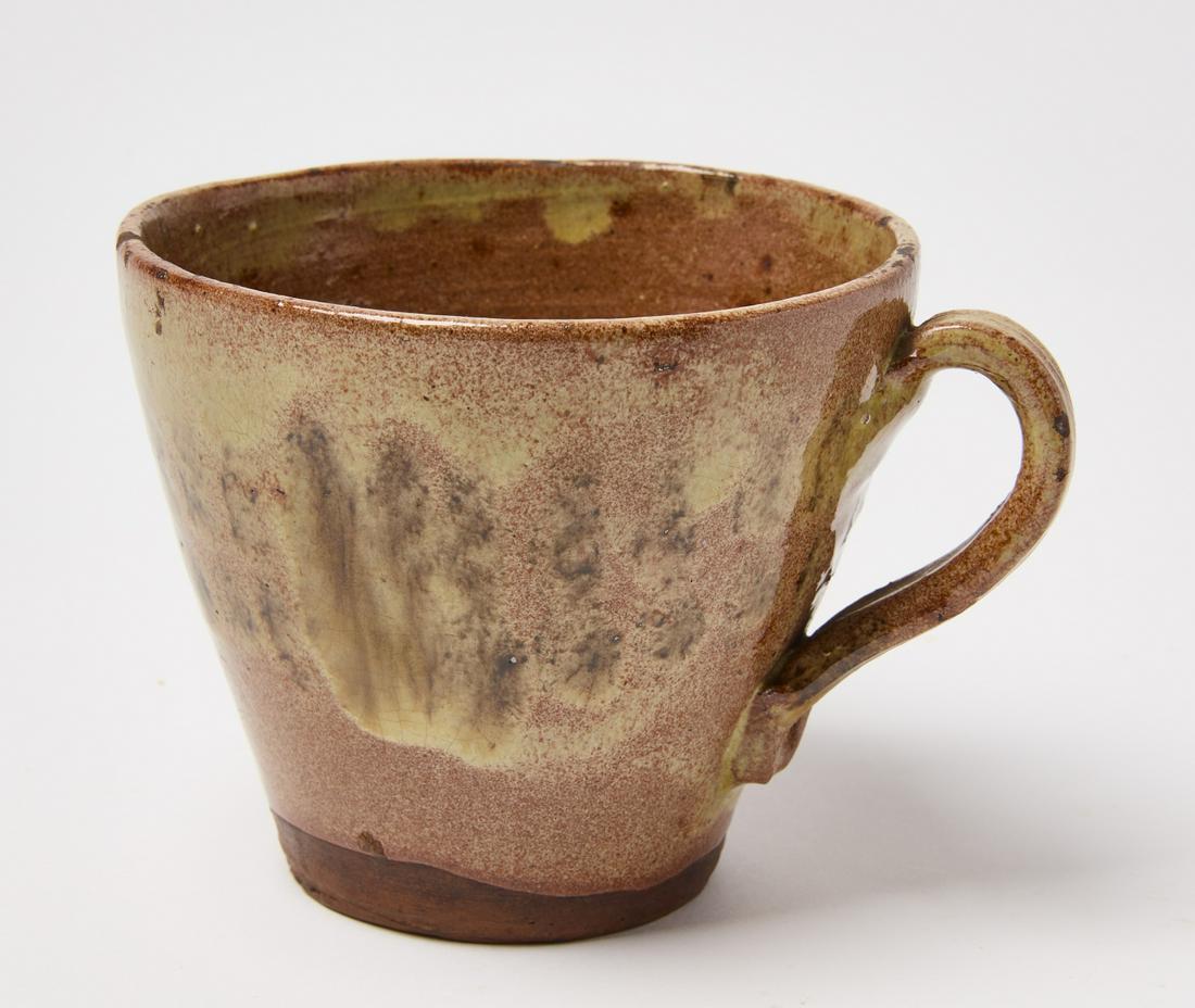 Maine Redware Mug: Redware mug with flared sides. Maine, circa 1830. H 3-3/4" D5-3/8". Condition: Excellent original condition. Very small rim chip. Copy and paste this link for high-res images: https://www.dropbox.com/