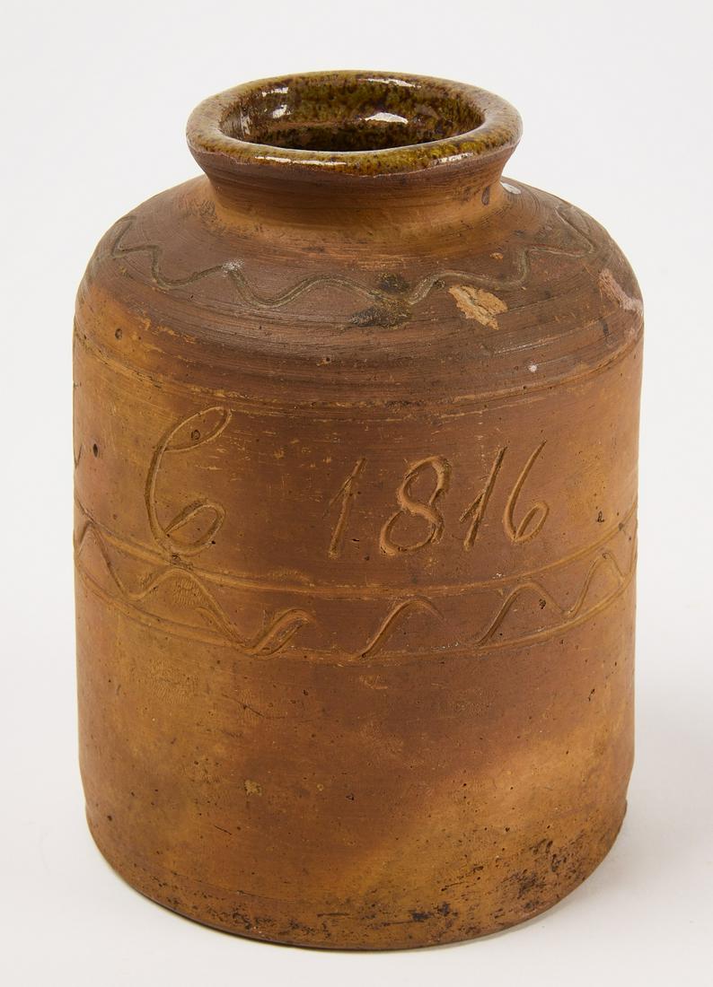 Redware Ink: Redware snuff jar with A.C.1816 incised on body of jar. Glazed inside not on the outside. H 5-5/8" D rim 2-3/8" D base 4-3/16". Condition: Excellent original condition. Provenance: Madeline Kileen. Co