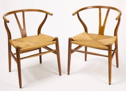 Pair Hans Wegner Chairs: Pair of Hans Wegner dining chairs. Condition: Original condition. One is stamped. H 28-5/8" Seat H 17-1/4" W 21" D 20" Copy and paste this link for high-res images: