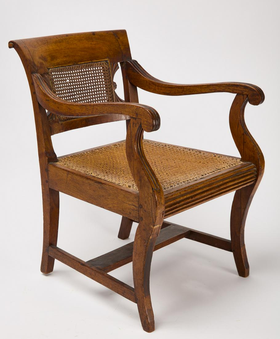 Child's Chair: Child's chair with cane seat. European, circa 1830. Condition: Excellent condition with minor imperfections. H 19-3/8" W 13-5/8" D 13-3/8". Copy and paste link for high-res images: https://www.dropbox