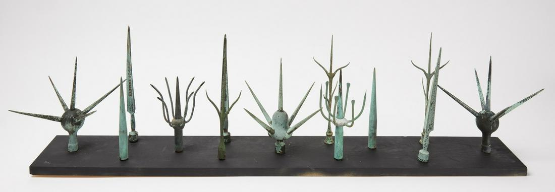 Collection of Bronze Lightening Rods: Collection of bronze lightening rods. Condition: Excellent condition with minor imperfections. Average H 8"-10". Mounted on a 40-1/2" long board. Copy and paste this link for high-res image: https://w