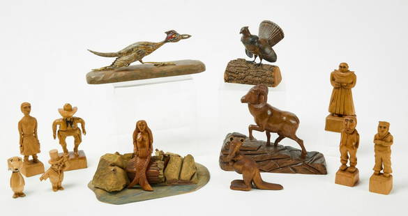 Group of 12 Carved Folk Art Figures: Group of 12 carved, wooden folk art figures made by Raymond Lanterman (1920-2000). Wooden figures include 5 animals, 6 figures, 1 mermaid. Condition: Excellent condition with minor imperfections. Smal