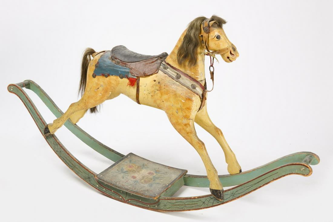 Rocking Horse: Yellow painted rocking horse with hair mane and tail. Condition: Excellent original condition. Late 19th century. H 45" L 63" D 13". Copy and paste link for high-res images: https://www.dropbox.com/sh