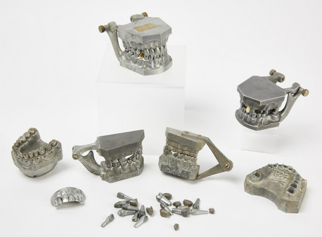 Dental Molds: 2 full tooth molds, 2 half mouth molds, 1 each upper and lower tooth mold. Loose teeth and partial mold in plastic bag. H 2-1/4" W 2-3/4" D 4". Copy and paste this link for high-res images: https://ww