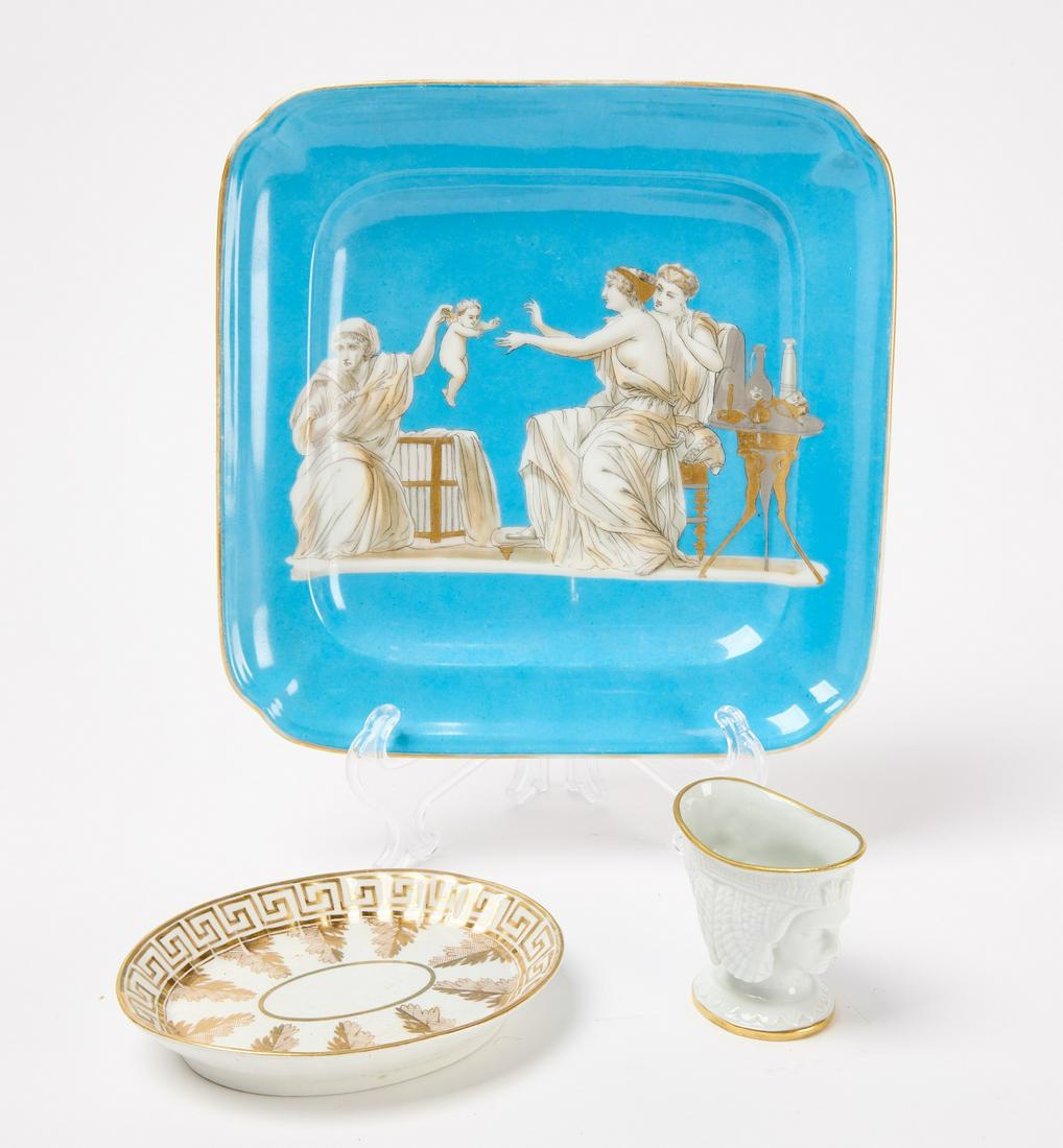 Three Classically Decorated Dishes: Three dishes with classic decoration. Condition: Plate H 9-1/2" W 9-3/4". Oval Dish L 6" W 5". Cup H 2-3/4". Copy and paste link for high-res images: