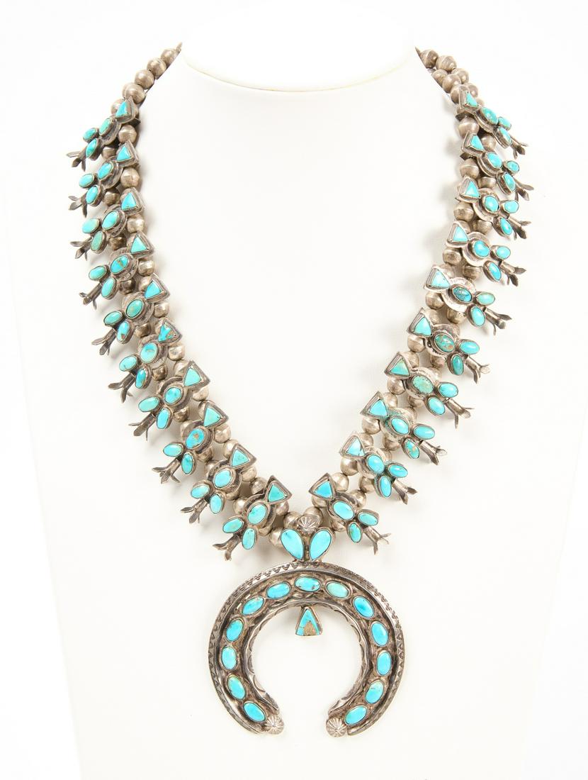 Native Squash Blossom Necklace: Vintage Native American squash blossom necklace. Turquoise set in silver. L 19". Copy and paste link for high-res images: https://www.dropbox.com/scl/fo/dkg4zeimjxi41gy0919ts/h?dl=0&rlkey=ompahho9oh1m