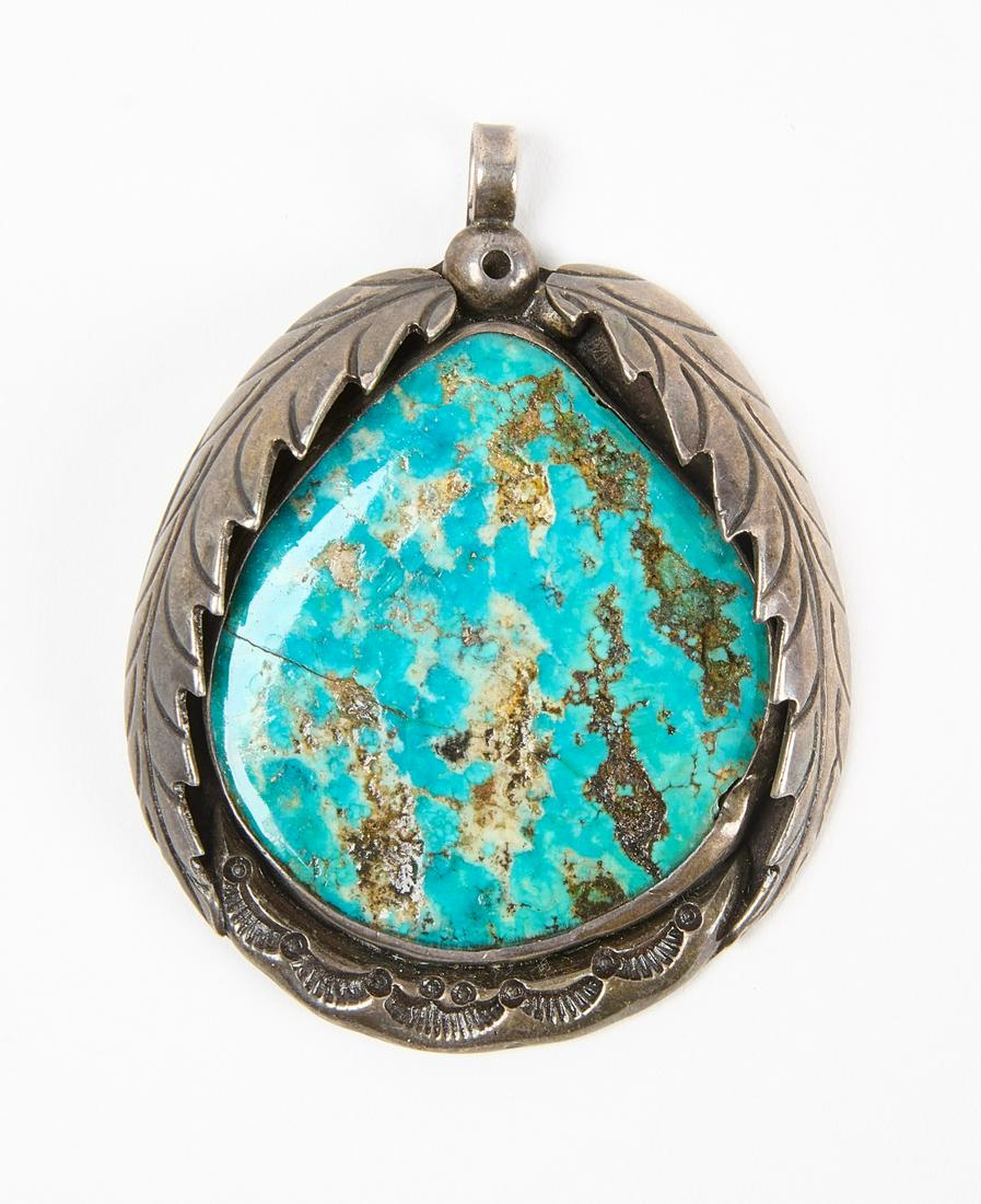 Navajo Silver and Turquoise Pendant: Navajo silver and turquoise pendant. H 2-5/8" W 1-7/8". Copy and paste link for high-res image: https://www.dropbox.com/s/uxn7zkxurwpsw8q/1836005_1.jpg?dl=0