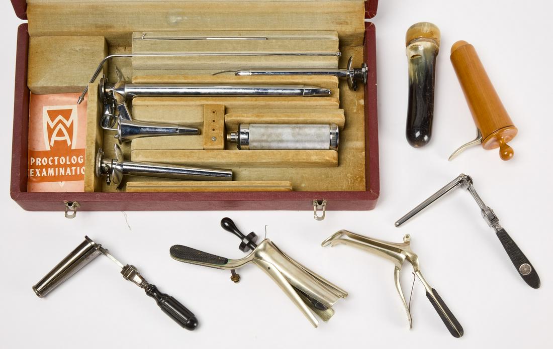 Proctology Set and Speculums: A good group of 19th century vaginal/rectal speculums with ebony handles and 20th century proctology set. Case H 10-1/2" W 20-1/4". Speculum Range L 6-7/8" to L 9-1/4". Condition: Label on case is wor