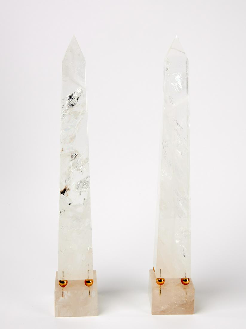 Pair of Quartz Obelisks: Pair of quartz obelisks with gold mounts. Designed by Joseph Grusczak. H 21-5/8" each. Condition: Excellent condition. Link for high-res images: https://www.dropbox.com/sh/2dtxprtejld0jcd/AABkrdoVnR4n