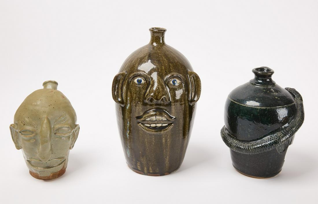 Three Pottery Face and Snake Jugs (1 of 3)