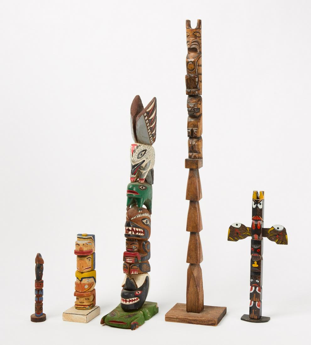 Totem Pole Group: Totem pole group. Carved and painted wood. Early to mid 20th century. Largest H 25". Condition: Minor imperfections Copy and paste link for high-res images: https://www.dropbox.com/sh/gu2otw978vmm4w7/