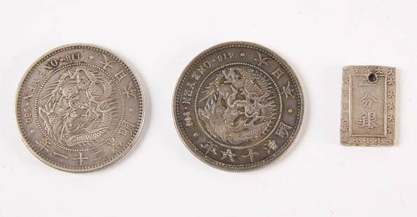 Three Japanese Silver Coins: 1) Two Japanese Yen 1888, Y-A25B, Type II 2) Japan BU Ichibu1837-1854 Tempo Era., holed. Total weight: 2.005 ozt. Descriptions, weights, sizes and conditions are our best judgement and do not represen