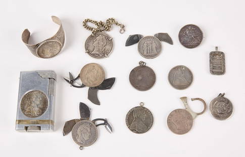 Silver Jewelry with Coins & Silver English Tokens: Silver jewelry with coins & silver English tokens 1. Three silver tokens 2. Germanic silver coin ser in large heavy white metal lighter, some damage, wear and scratches along with 1921 silver dollar s