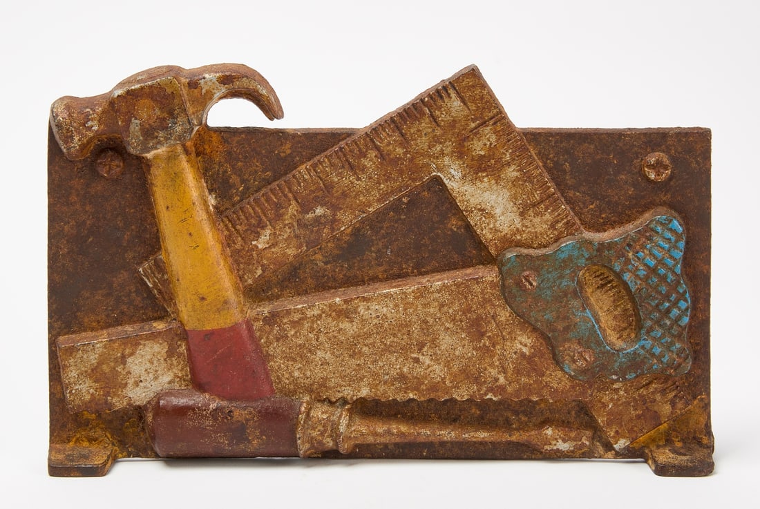 Tools Doorstop: Cast iron 'tool' doorstop. Cast iron with traces of paint. Circa 1900. H 6-5/8" W 11-3/8". Condition: Original condition with wear. Link for high-res images: https://www.dropbox.com/sh/5sj9xqpco73y3t8