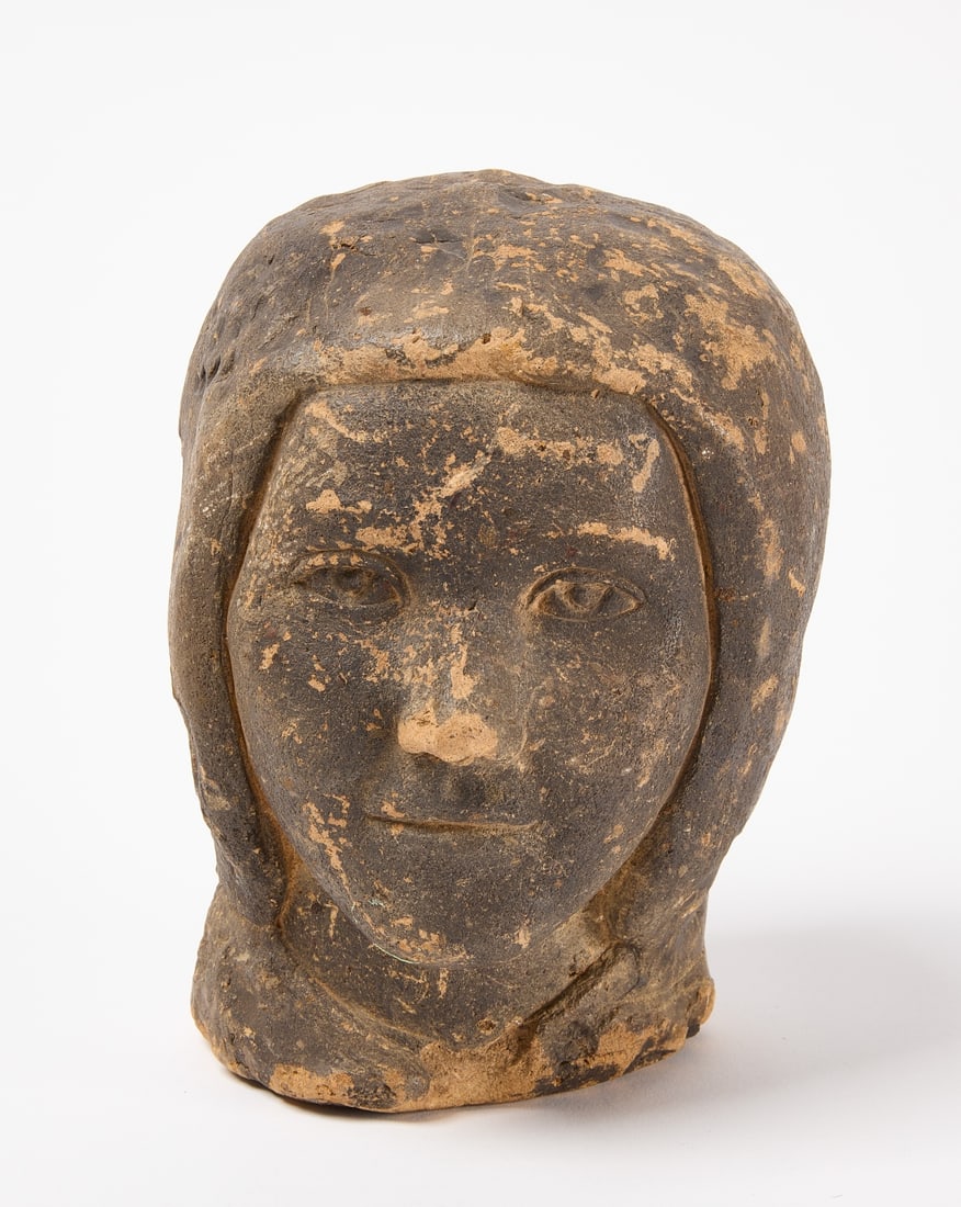 Carved Stone Female Head (1 of 4)