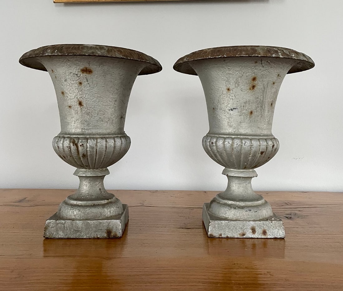Small Pair of French 19th Century Cast Iron Campana Urns: Small pair of French 19th century cast iron campana urns. France, circa1890 H: 10.25 in Diameter: 8.25 in Base: 4 in sq Interior Depth: 6.25 in https://www.theelementalgarden.com/shop/-pair-french-sil