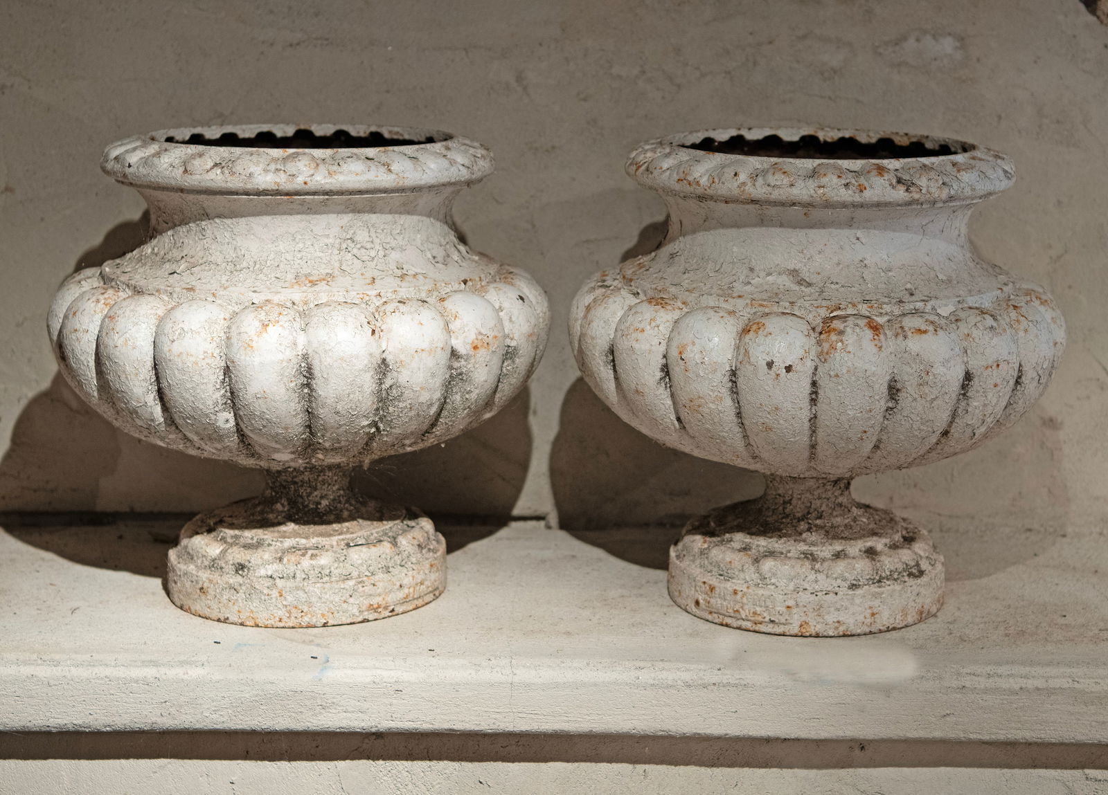 French 19th C Cast Iron Lobed Urns Signed Alfred Corneau: Pair of French 19th C Cast Iron Lobed Urns Signed Alfred Corneau. France, circa 1880. H: 15.75 in D: 18 in Foot: 9.50 in diameter. Condition: Excellent condition. Old paint and with minor i