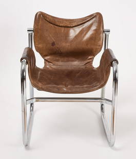 Maurice Burke for Arkana - Armchair: Maurice Burke for Arkana. Vintage brown leather armchair with chrome frame. Circa 1970. Condition: Excellent with mild wear from use. H 33" W 24" D 22-3/4" SH 15-3/4" &nb