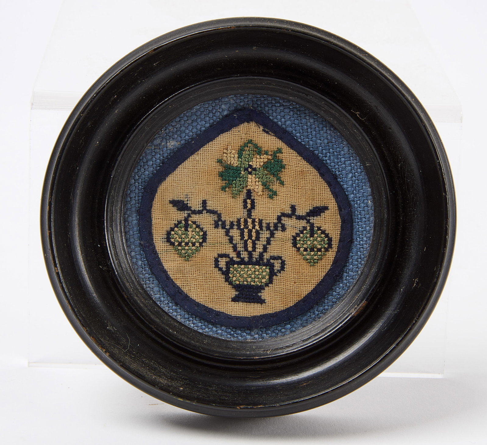 Miniature Needlework of a Potted Plant: Miniature needlework of a potted plant. Frame: D 4-1/8" Sight: D 2-5/8" Condition: Excellent with minor imperfections. 