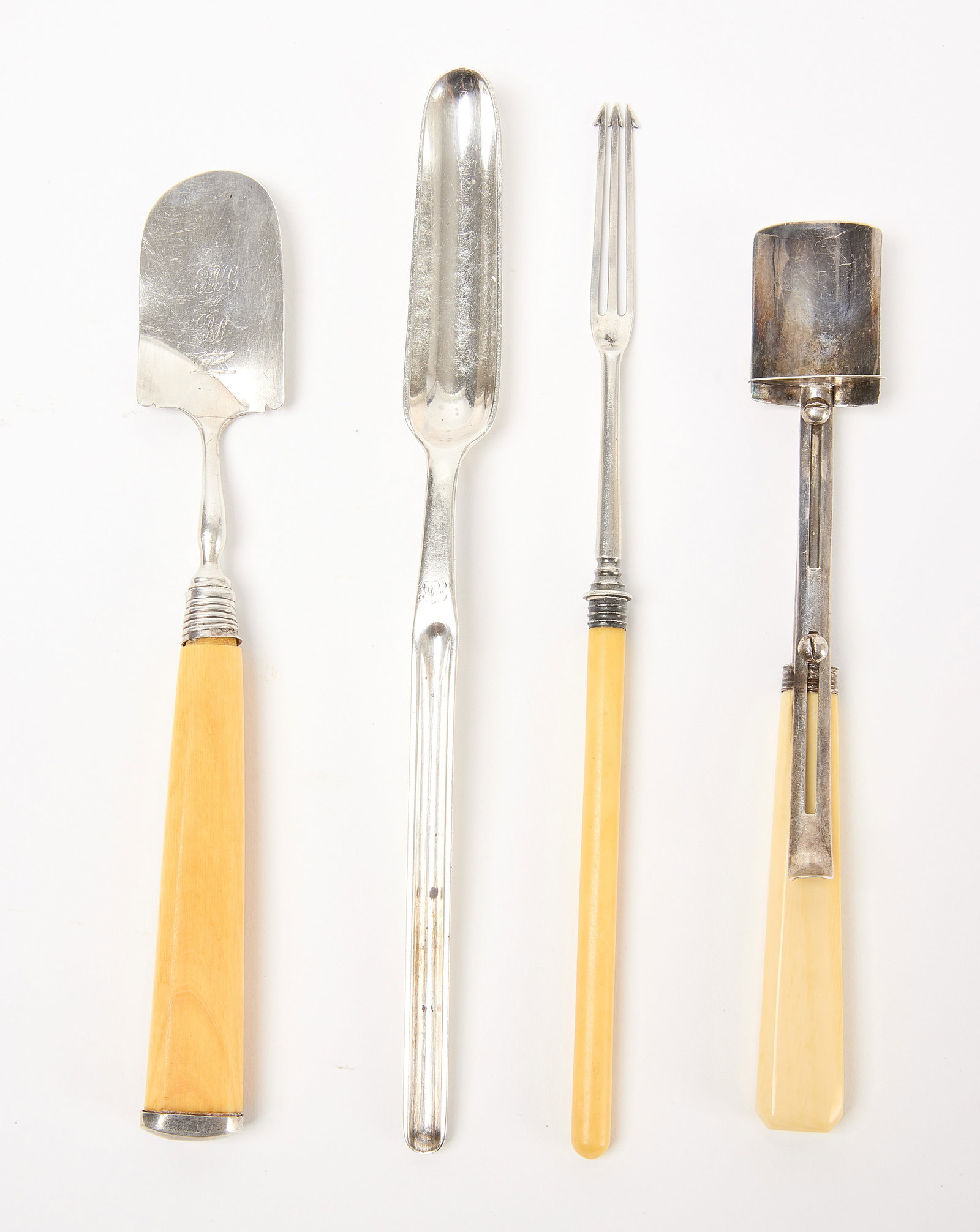Antique Silver and Bone Marrow Scoops and Utensils: Bone marrow scoops and utensils. All hallmarked. Silver and bone. English, 19th century. H 7-1/4" to H 8-3/4" Condition: Excellent condition with minor imperfections. 