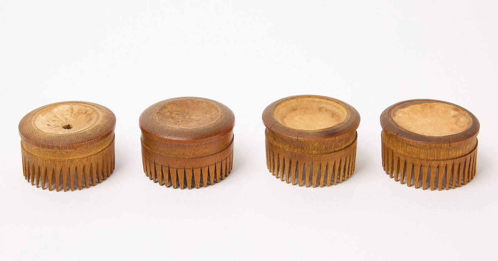 Four Shaker Combs Auction