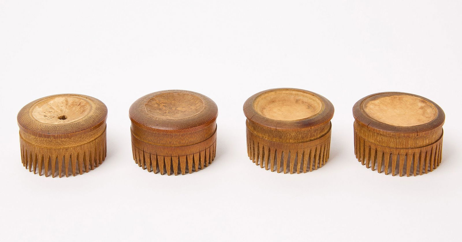 Four Shaker Combs Auction