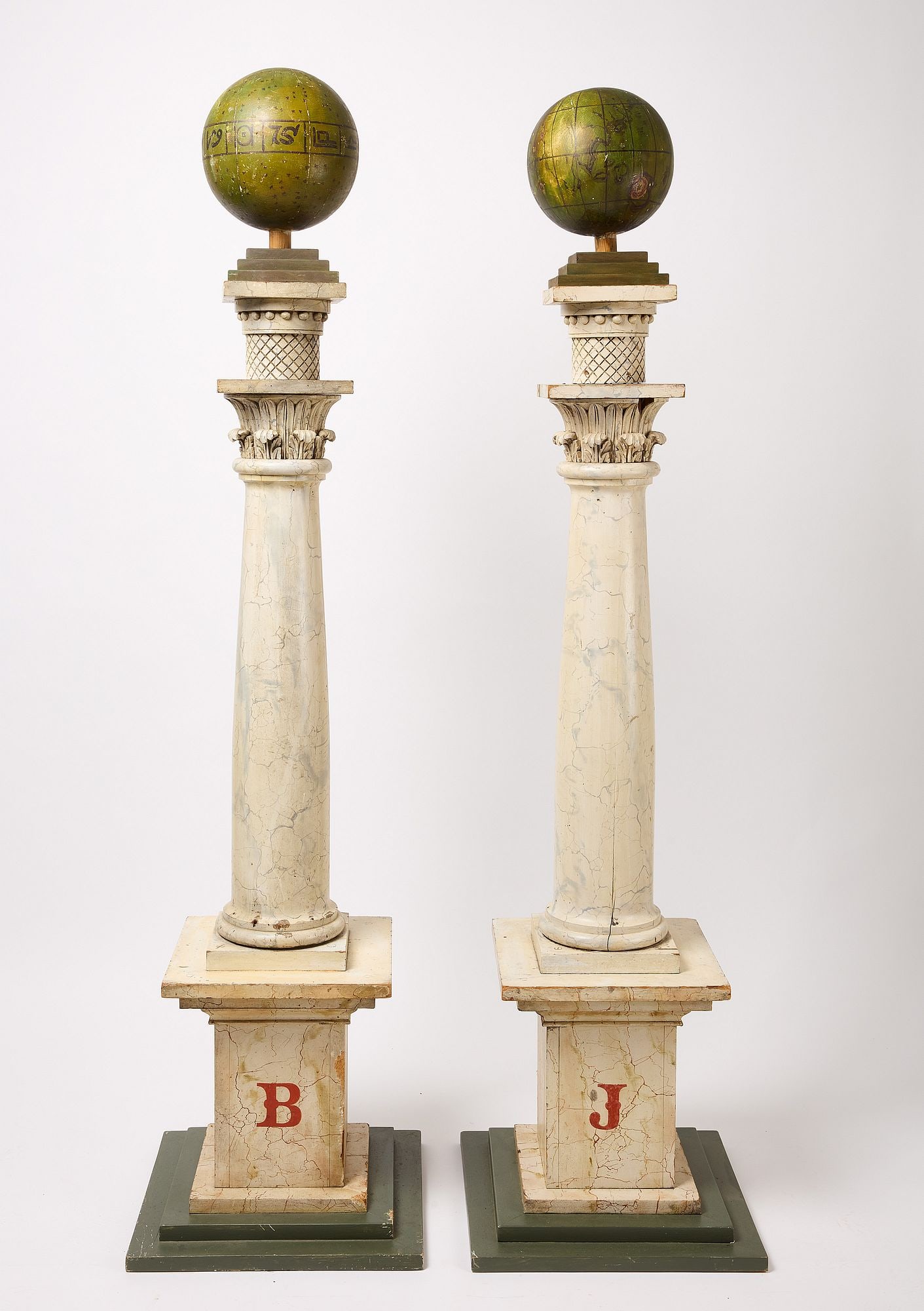 Pair of Carved Fraternal Columns: Pair of fraternal columns. Carved and painted wood. American, circa 1900. H 72". Condition: Excellent condition. Copy and pate link for high-res images: https://www.dropbox.com/scl/fo/j7hbw