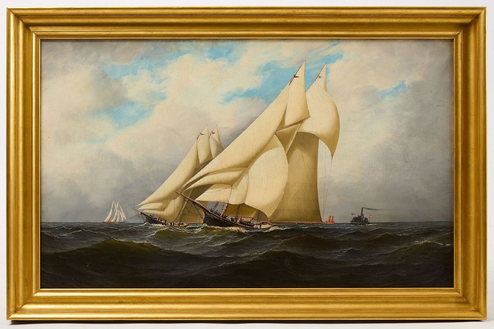 Antonio Jacobsen - Marine Oil on Canvas: Antonio Jacobsen - The Yacht Dreadnought with tall ships and steam boat in background. Oil on canvas. Unsigned. We believe this painting is number 15 in the attached Jacobsen checklist. Frame: H 26-1/