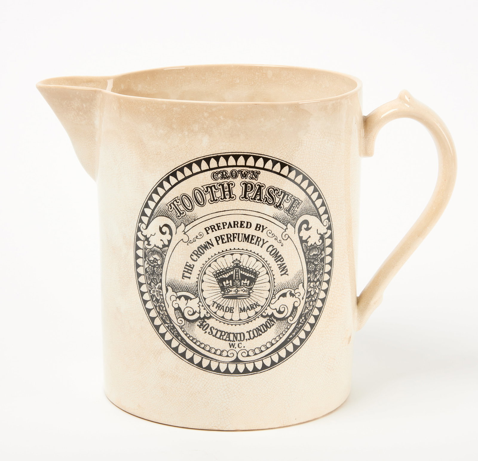 Dental Related Creamware Pitcher: Creamware pitcher. One side reads: 'Creme cosmetique de savon d'amandes. A delightful preparation for the toilet', and the other: 'Crown tooth paste, prepared by The Crown Perfumery Co