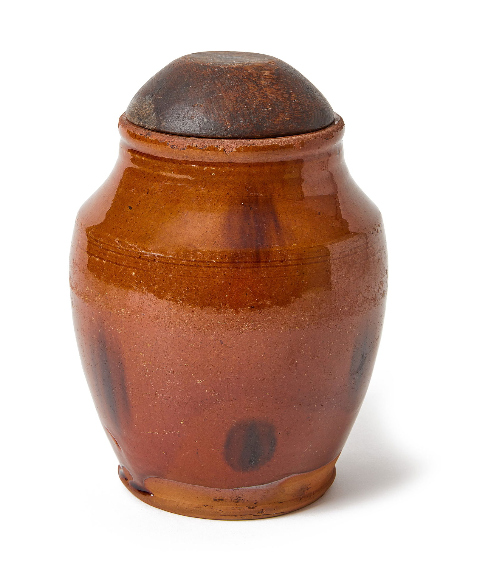 Redware Jar with Original Carved Wooden Lid: Redware jar with original carved wooden lid. Probably Connecticut, circa 1800. H 7-1/2" D 5" Condition: Excellent condition with minor imperfections. Link to hi-res images: https://www.