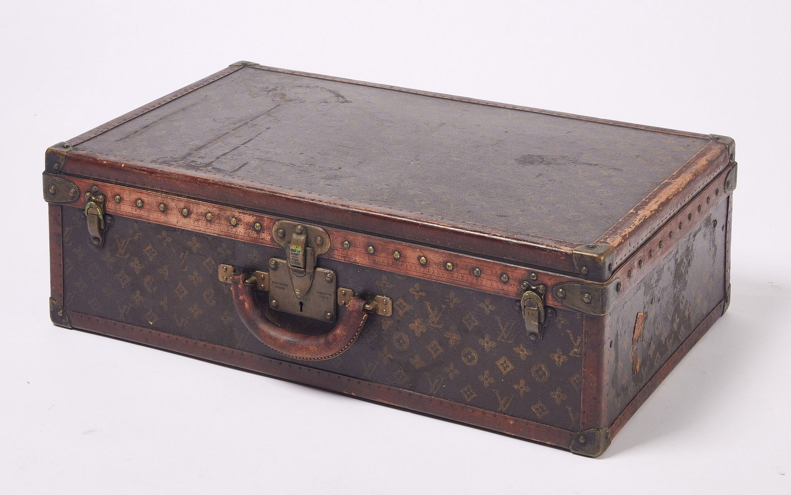 Louis Vuitton Suitcase: Louis Vuitton Suitcase. H 8-3/4" W 27-3/4" D 17-1/4". Condition: Minor wear and imperfections. Link to hi-res images:https://www.dropbox.com/scl/fo/5aofcf1pnqlaun5idk5yt/ACAzEM-Xx