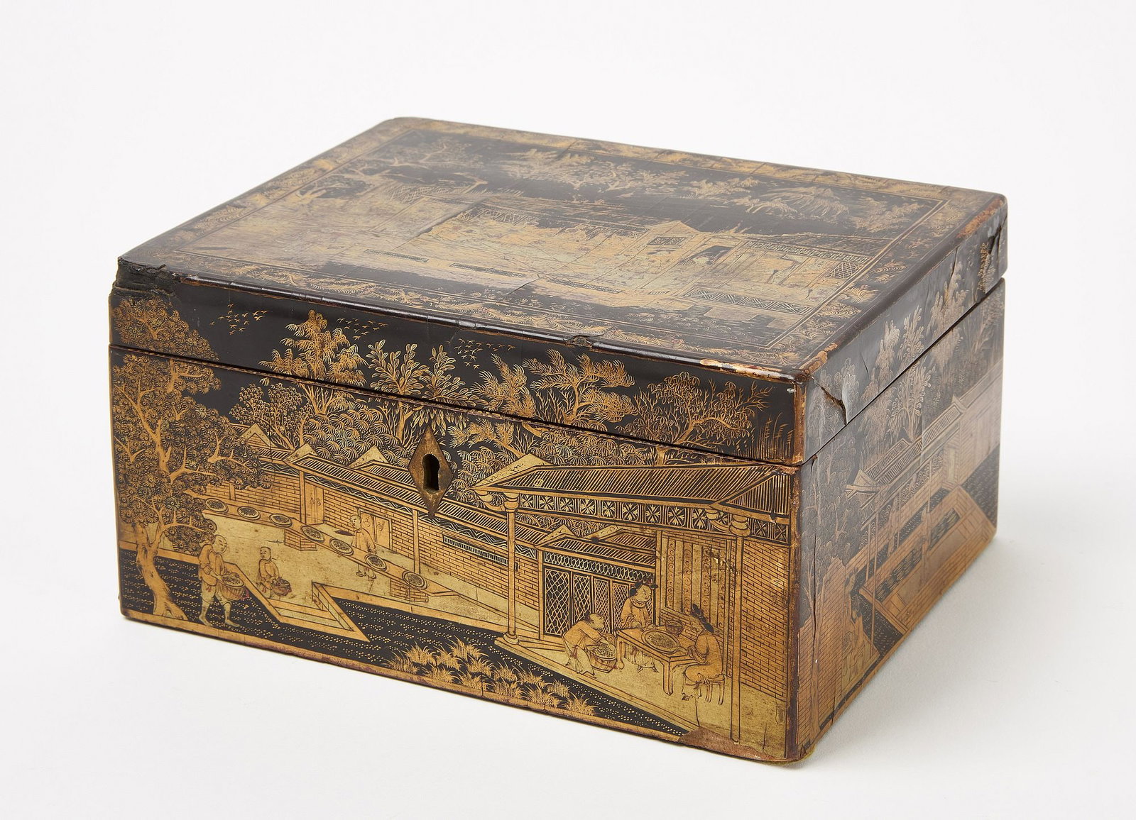Chinese Lacquered Tea Box: Lacquered tea box with two interior removable lidded compartments. H 4-1/4" W 8-1/8" D 6-3/8". Condition: Lacquer splitting on lid top and sides and breakage to front left corner. 