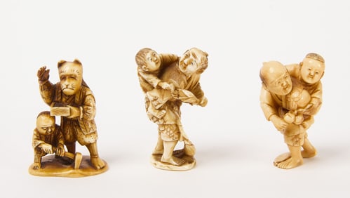 Three Netsuke of Men with Children