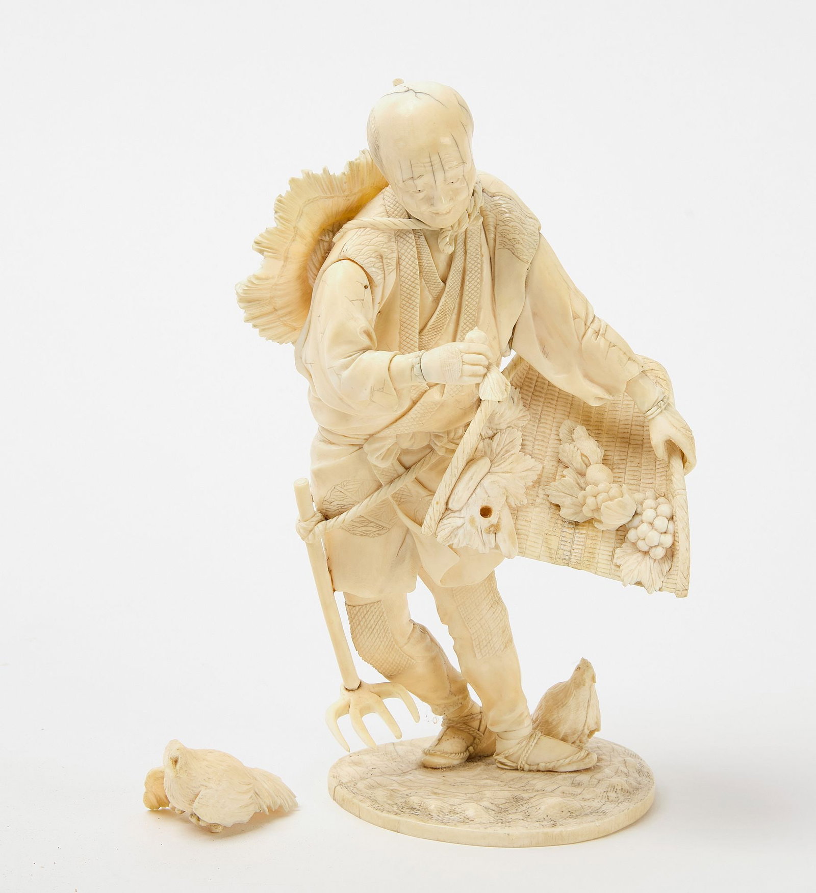 Carved Bone Chinese Figure: Carved bone figure of an Asian man performing harvesting activities. 19th century. H 9" W 5". Condition: Both birds are detached. Link to hi-res images: https://www.dropbox.com/scl/fo/w