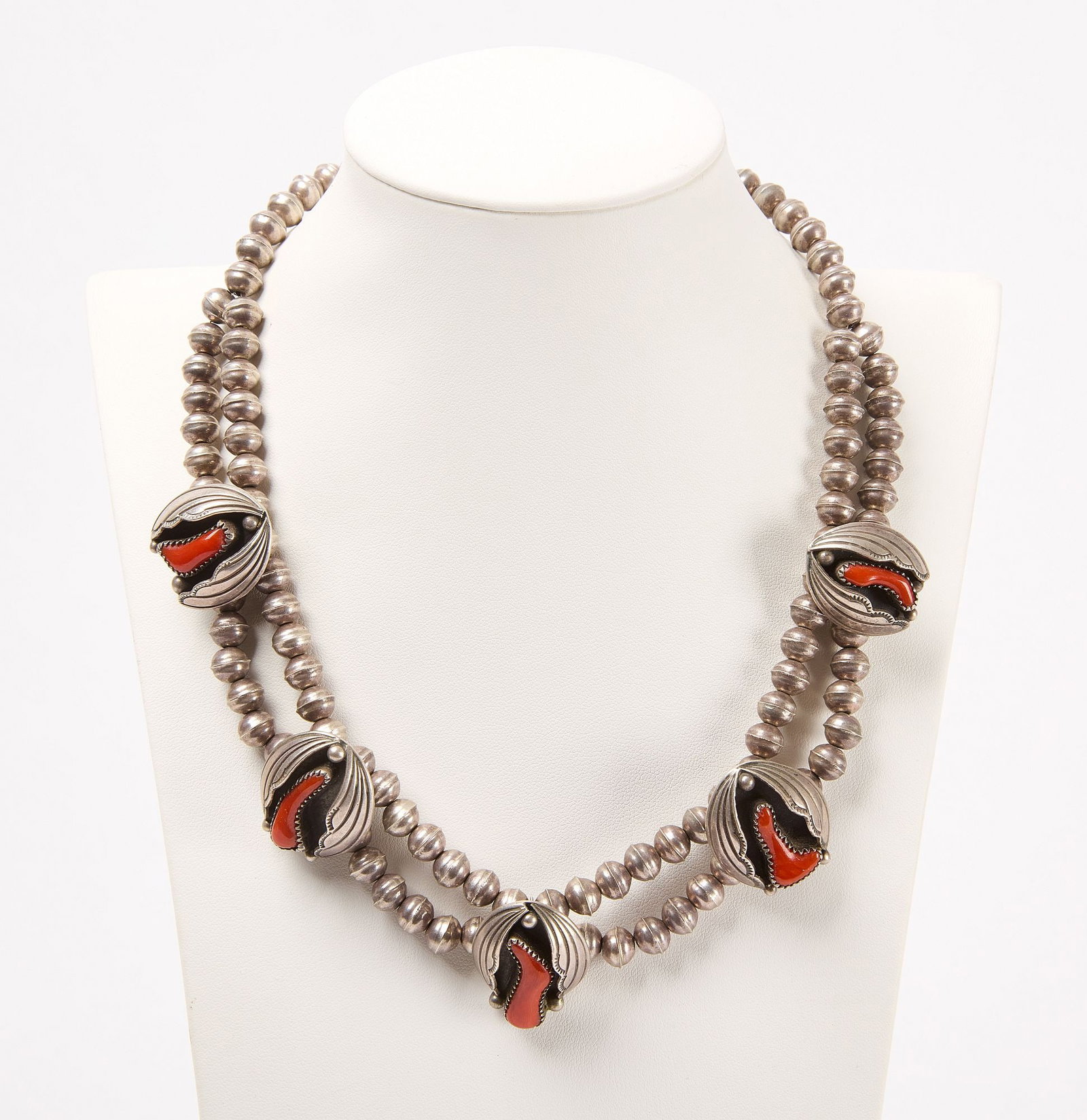 Native American Silver with Coral Necklace: Vintage Native American silver with coral necklace. Signed will hallmark by the artist. Circa 1960. L 16". Condition: No damage noted. Link to hi-res image: https://www.dropbox.com/scl/fi/3fdw7as