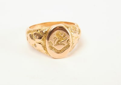 Gold Signet Ring with Lion Heads and Diamonds