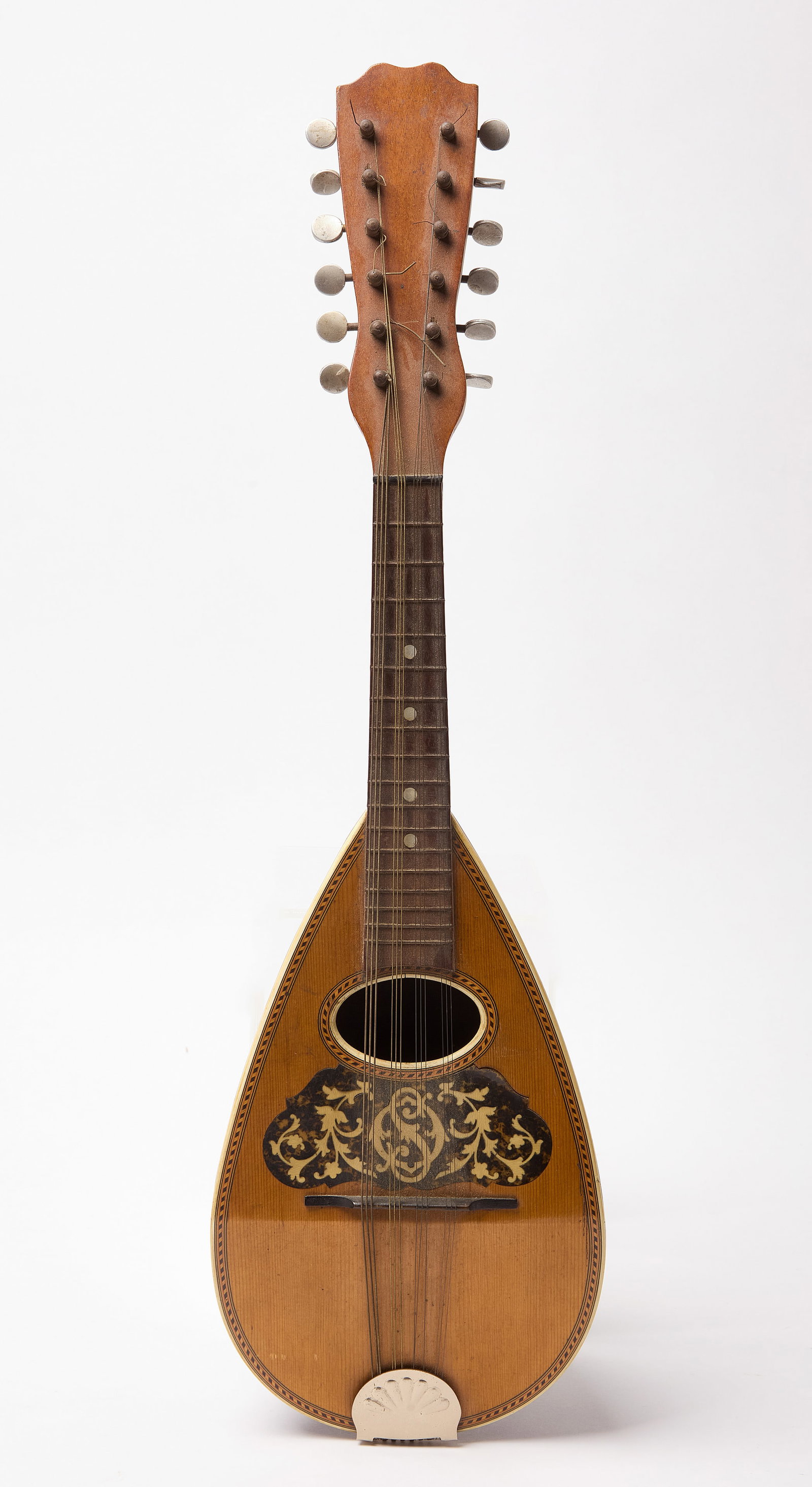 Mandolin: Mandolin. With original canvas case. Italian, late 19th century. Mandolin: H 6" L 25" W 7-1/4". Case: H 9" L 26" W 8-3/4". Condition: Mandolin with slight warping o