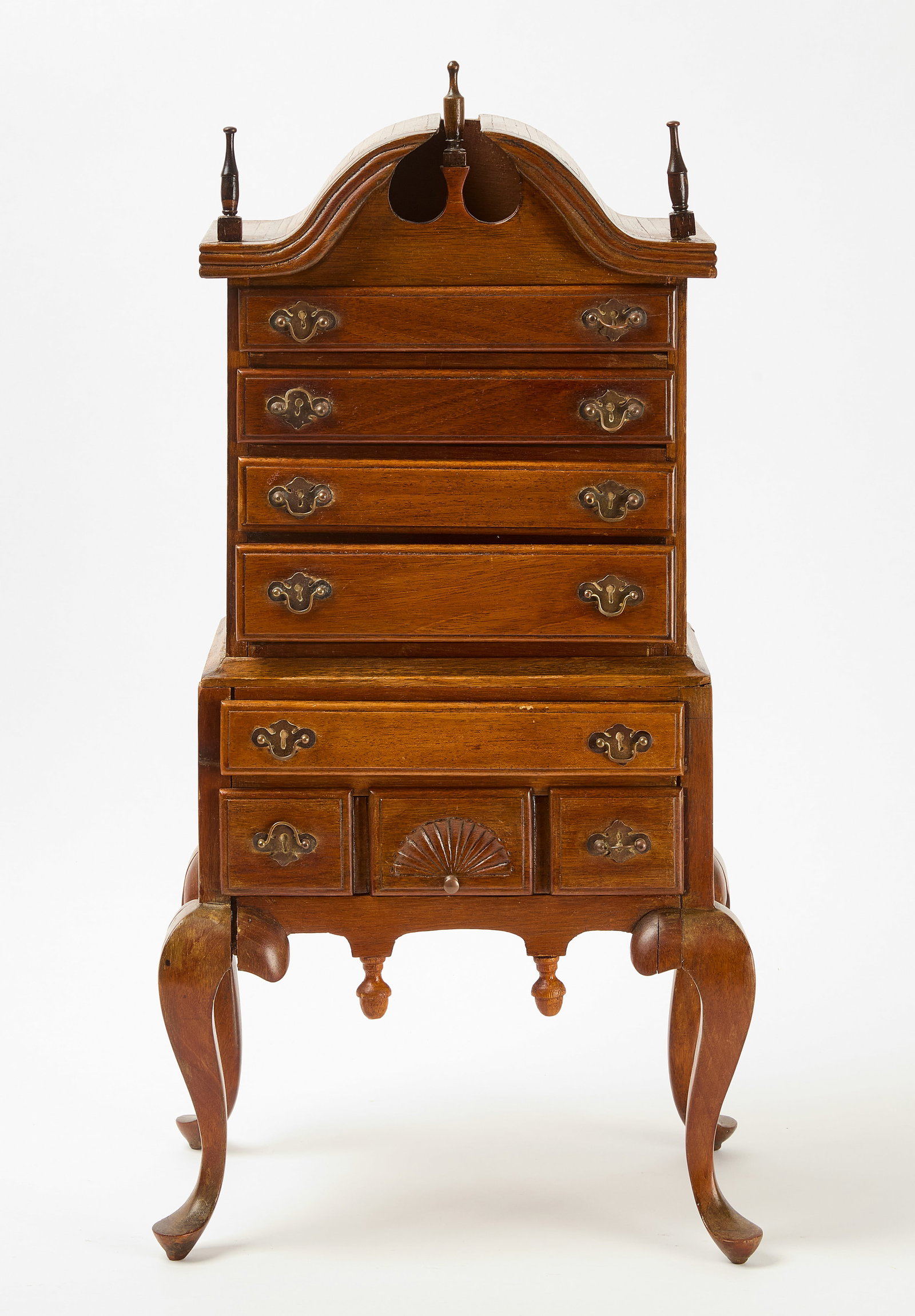 Miniature Highboy: Miniature highboy model. H 27-1/2" W 13-1/2" D 9-1/2". Condition: body damage and separation noted. glue residue from previous repairs noted on body. right finial broken off. 
