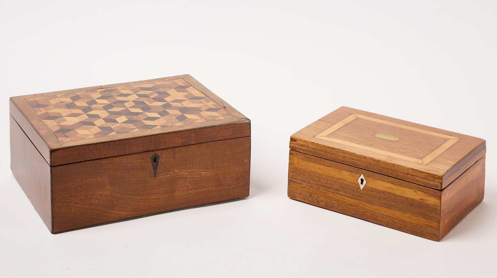 Two Jewelry Wooden Boxes: Two jewelry wooden boxes. American, 19th century. H 5" W 12-1/4" D 9-1/2". H 4" W 9-3/4" D 6-3/4". Condition: No damage noted. 