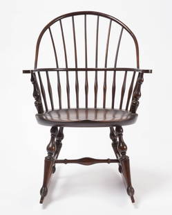 Wallace Nutting Windsor Rocking Chair: Wallace Nutting Windsor rocking chair. Retains paper label under seat. American, early 20th century. H 36-3/4" W 25-1/4" D 16-1/2". SH 18". Provenance: Collection of Linda B. Palme