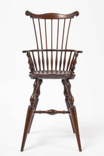Wallace Nutting Child's High Chair: Wallace Nutting child's high chair. Retains original paper label and block punched Wallace Nutting. American, early 20th century. H 38-3/4" W 17-1/4" D 16". SH 22". Provenance: