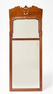 Wallace Nutting Two-Part Mirror: Wallace Nutting two-part mirror. Beveled glass in walnut frame. Block branded 'Wallace Nutting' on reverse. American, early 20th century. H 42" D 16-1/2". Provenance: Collection of L