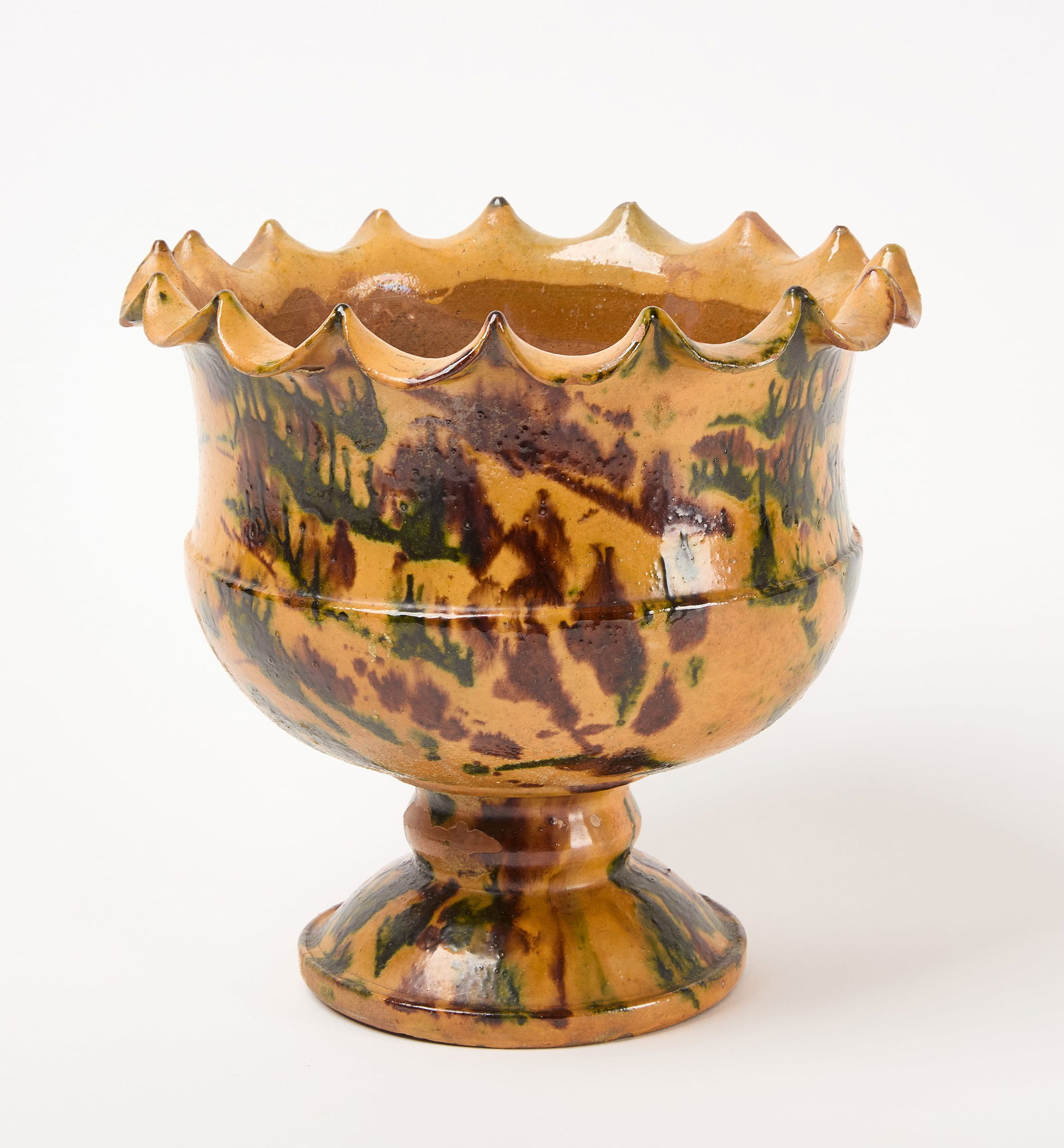 Wagner Redware Compote: Redware compote with brown and green glaze.Attributed to George Wagner. Pennsylvania 19th century. H 9-1/2" D 9-3/4". Condition: Minor imperfections, edge wear. Link to hi-res images: https://www.drop