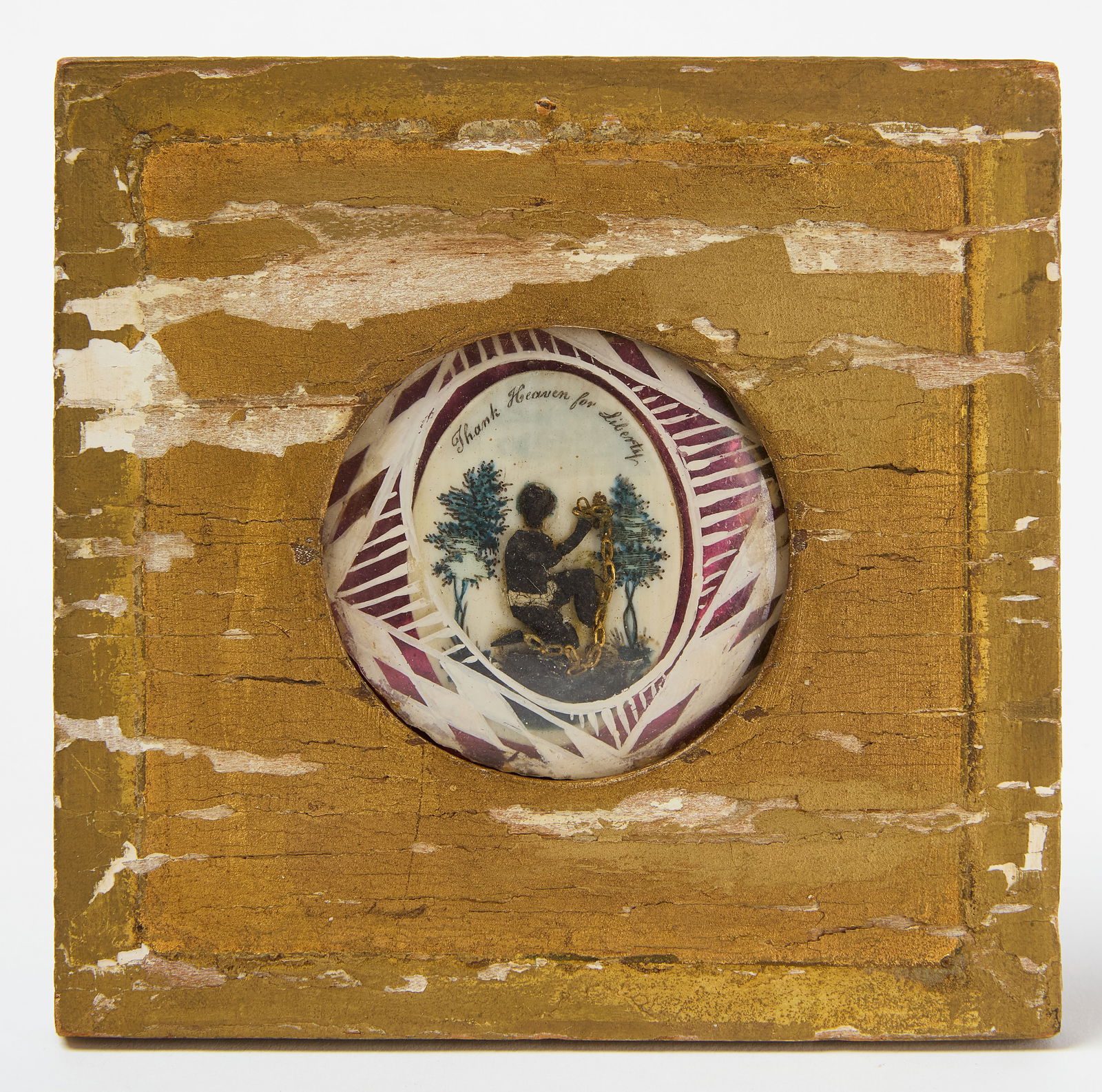 Early Abolitionist Miniature Scene on Bone: Early abolitionist scene on bone. Shows a kneeling man in chains with words above reading 'Thank Heaven for Liberty'. American, circa 1840. Frame: H 4-1/4" W 4-3/8" Sight: D 2&q