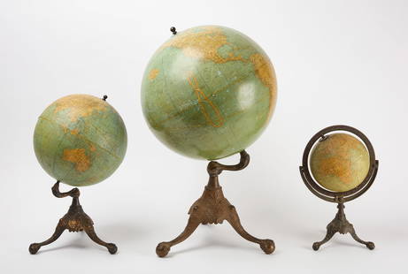 Three Globes by Rand McNally & Co.: Three globes by Rand McNally & Co. Each on brass base with claw-and-ball feet. Largest: H 30 in. Dia. in. Mid: H 20-1/2 in. Dia. 12 in. Smallest: H 16-1/2 in. Dia. 8