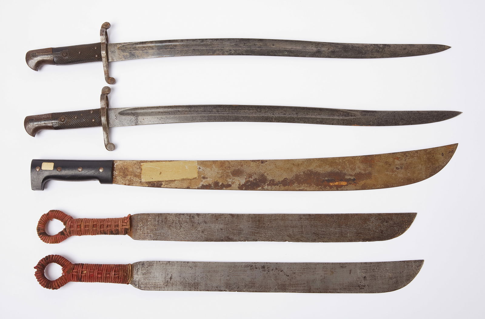 Two Island Swords, Two English Bayonets, and Machete (1 of 7)