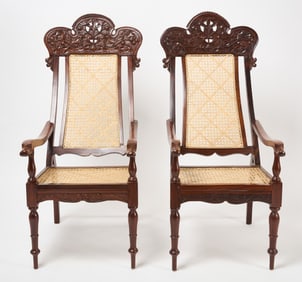 A Pair of Rosewood Caned Planter’s Armchairs